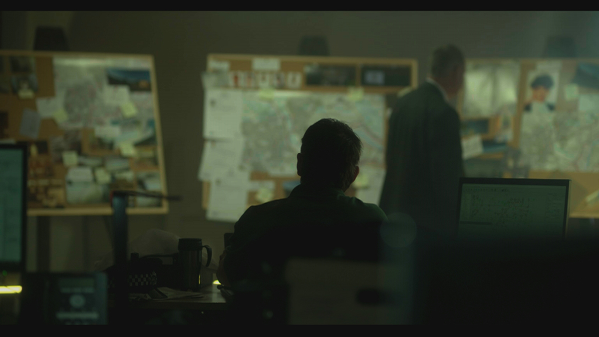 Killer At The Crime Scene Image